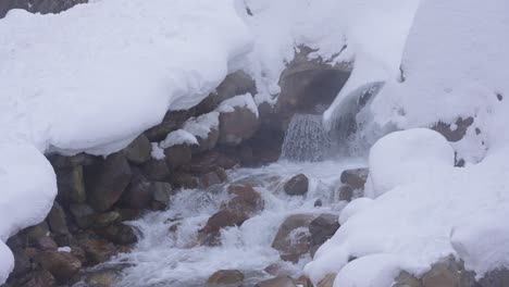 Pristine-Mountain-Stream-Flowing-Through-Ice-Melt,-Nagano-Japan