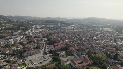 -Monte-Latito-landscape-view-with-the-dukes-palace,-guimaraes-castle-and-church-in-Portugal-picturesque-aerial-dolly-out