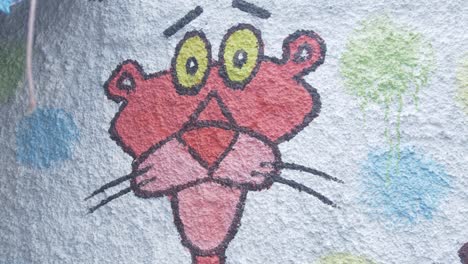 Pink-Panther-cartoon-mural-painted-on-wall-close-up