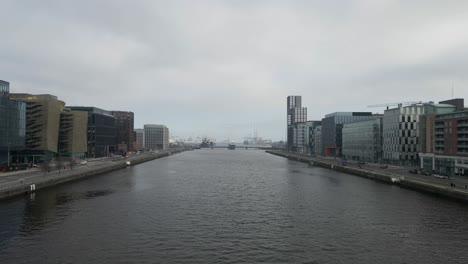 Drone-shot-of-Dublin's-Docklands-and-the-River-Liffey