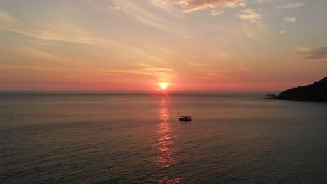 Best-sunset-over-ocean-in-Cambodia,-Koh-Rong-sland,-aerial-drone-view