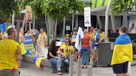 Peaceful-demonstration,-people-united-at-Brisbane-square-to-share-and-voice-out-for-the-people-in-Ukraine,-showing-love-and-supports-and-protest-against-war-and-against-Russian's-unlawful-invasion