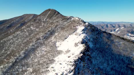 aerial-pullout-to-wide-shot-of-snake-mountain-nc,-north-carolina-near-boone-nc