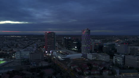 City-skyline-office-buildings-district-aerial-view-at-dusk-Bucharest-,-Romania