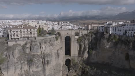 Aerial-reveals-famous-'new'-bridge-in-Ronda-Spain,-from-medieval-times