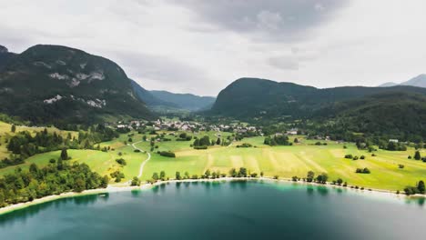 Aerial-view-of-Slovenia-tourist-destination-bohinj-lake-in-the-valley-of-alps-mountains,-European-natural-park-scenery-landscape
