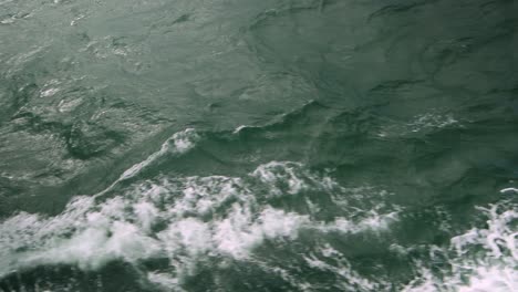 Boat-wake-wave-ocean-rolling-â€“-4K-Ultra-HD-UHD