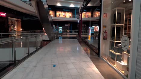 POV-Walking-Back-Along-Empty-Deserted-Second-Floor-At-As-Cancelas-Shopping-Center-In-Galicia,-Spain