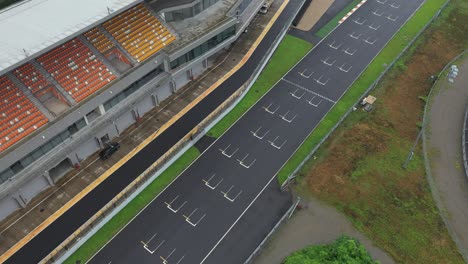 Aerial-pan-shot-over-the-sport-car-circuits-track-in-china