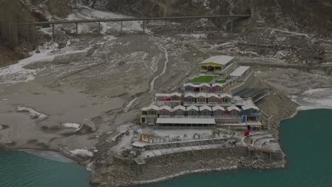 Aerial-View-Of-Luxus-Hunza-Hotel-Beside-Attabad-Lake-In-Paksitan