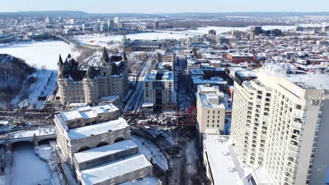 Aerial-View-Of-Freedom-Convoy-Protesters-Blocking-The-Streets-Around-The-Fairmont-Chateau-Laurier-In-Ottawa,-Canada
