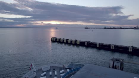 Ferry-docked-at-Tsawwassen-Vancouver-terminal-at-sunset,-British-Columbia-in-Canada