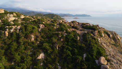 Aerial-rising-revealing-beautiful-landscape-of-Ninh-thuan-coastline,-Vietnam