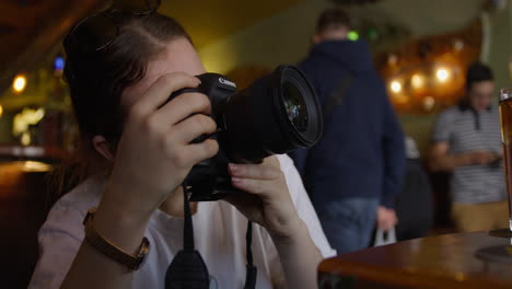Photographer-In-Amsterdam-Cannabis-Coffee-Shop-Taking-Photos-4K-Slow-Motion-RED-Camera
