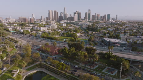 Approaching-the-City-of-Angels,-Aerial-Drone-Shot-of-Los-Angeles-Skyline-in-Daytime