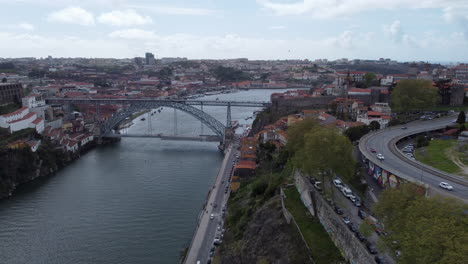 Aerial-pan-left-shot-of-Dom-Luis-I-Bridge,-Porto,-Portugal
