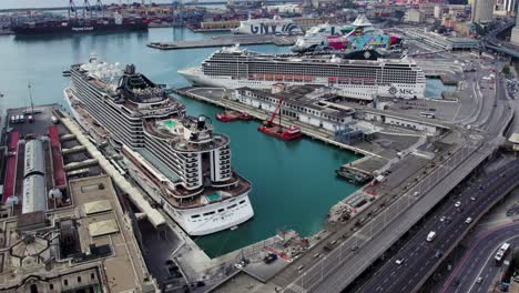 MSC-Cruise-Liner-Ships-in-Boat-Port-in-Genova,-Italy---Aerial