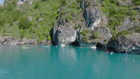 Kayakers-Exploring-Capillas-De-MÃ¡rmol-On-Lake-General-Carrera