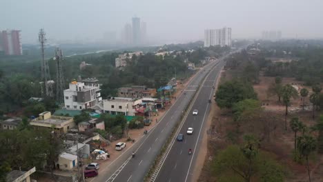 Beautiful-aerial-view-of-a-highway-without-traffic-and-nature-in-early-morning-light