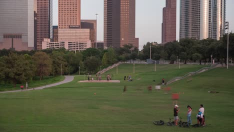 Time-lapse-of-people-at-park-across-from-downtown-Houston