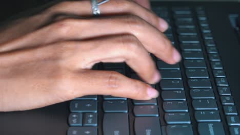 Close-Sot-of-Female-Hands-Typing-on-a-Laptop-Computer