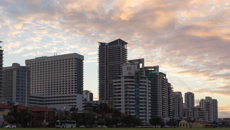 Sunrise-time-lapse-of-the-east-Perth-skyline-with-changing-ambient-light