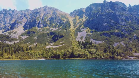 Time-lapse-pan-of-glacial-mountain-lake-Popradske-pleso-in-High-Tatras,-Slovakia