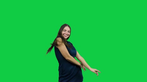 Glückliches-Mädchen,-Das-Vor-Dem-Grünen-Bildschirm-Tanzt