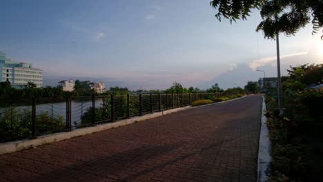 Joggers-and-fitness-buffs-enjoy-the-fresh-morning-air-on-The-Esplanade,-a-popular-scenic-attraction-alongside-the-Iloilo-River,-which-is-acknowledged-as-Asia's-cleanest-river