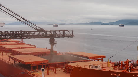 Time-lapse-of-Paranaguá-port,-a-Ship-is-been-carried-with-soy,-Parana,-Brazil