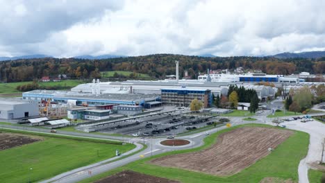 Aerial-view-of-factory,-industrial-plant-in-rural-countryside,-IMPOL-aluminum-factory-in-Slovenska-Bistrica