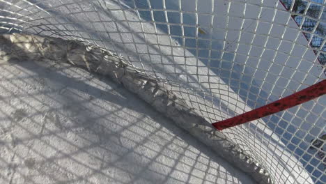 Hockey-puck-POV-scoring-goal-on-empty-net