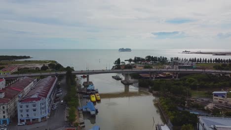 Aerial-static-of-wide-indian-ocean-and-car-bridge-in-mallaca-city,malaysia