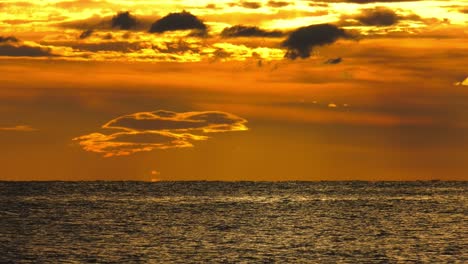 dramatic-sunrise-skies-over-sparkling-silver-sea