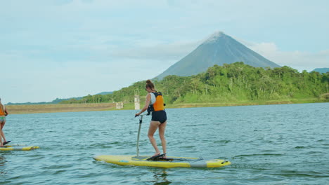 Shot-of-girl-paddling-on-Arenal-Lake-in-Costa-Rica