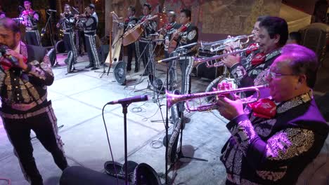 Wide-angle-shot-of-Mariachi-band-with-singer-talking-directly-to-the-camera
