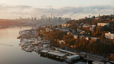 Drone-Aerial-Rise-on-Lake-Union-with-Seattle-Skyline-in-background-and-morning-traffic