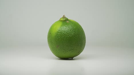 Lime-Fruit-Rotating-Clockwise-On-the-Turntable-With-Pure-White-Background---Close-Up-Shot