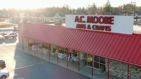Aerial-of-bankrupt-AC-Moore-Arts---Crafts-Store-sign-during-morning-sunlight