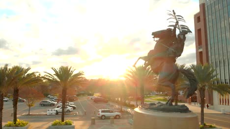 Aerial-View-of-Unconquered-Statue-at-FSU-Campbell-Stadium-During-Sunset