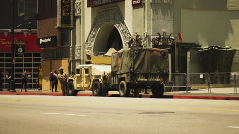 Military-officers-and-army-vehicles-in-Los-Angeles-streets,-Black-Lives-Matter-protest