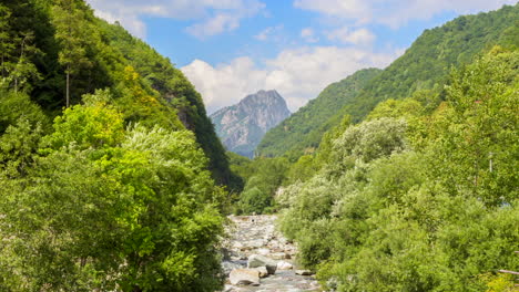 Timelapse-of-Mongioie-peak-in-Nava-and-the-river-Tanaro-leading-to-the-mountain-in-Ormea-valley