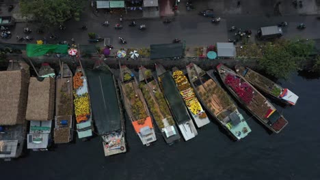 Aerial-tracking-view-of-floating-flower-market-in-Saigon-or-Ho-Chi-Minh-City-in-Vietnam