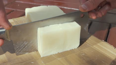 Cutting-natural-homemade-bar-soap-into-bars