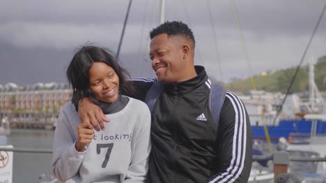 Portrait-of-young-black-couple-in-love-smiling