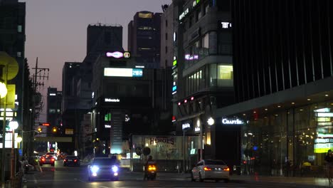 Narrow-Korean-street-in-Gangnam-district-at-night-on-sunset,-much-fewer-people-than-usual-in-Gangnam,-Seoul-South-Korea