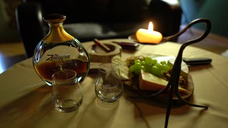 refreshments-including-Zacapa-rum-set-on-a-table-in-mens-club-with-dim-lights