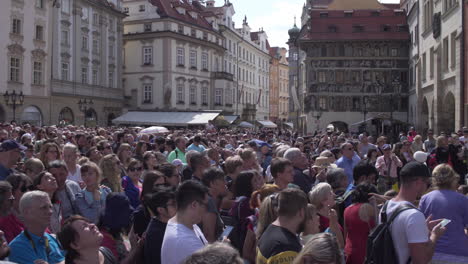 Crowd-of-Tourists-waiting-for-the-chiming-the-hour-in-the-Astronomical-Clock,-Prague,-Czech-Republic