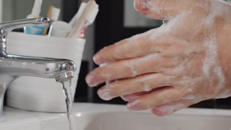 slow-motion-man-washing-his-hands