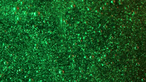 Millones-De-Burbujas-De-Color-Verde-Jade-Se-Elevan-A-Través-De-Un-Medio-Líquido.